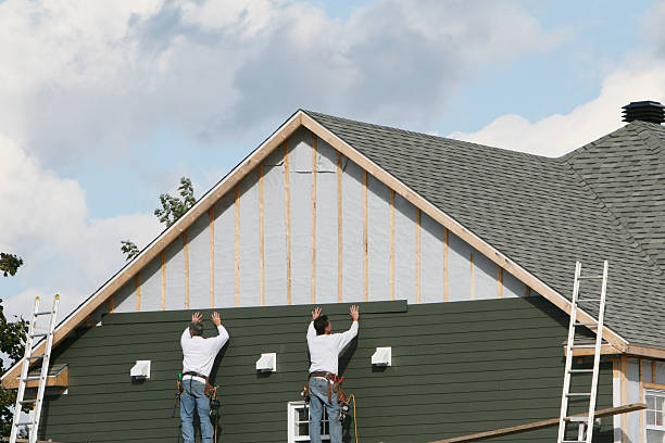 Professional Storm Damage Siding Repair technician working in Mill Spring, NC